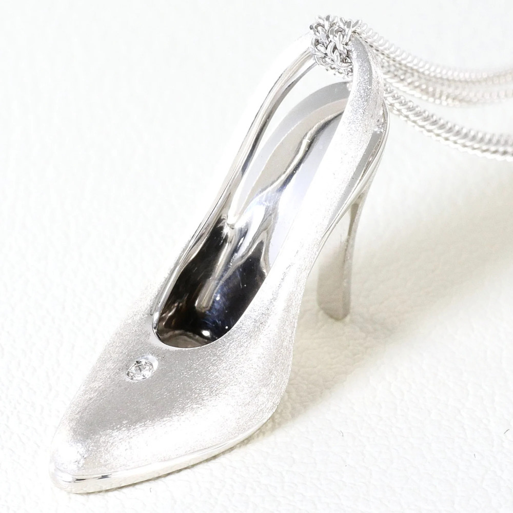 18K (18-karat white gold) necklace with diamond (no carat marking), includes ...